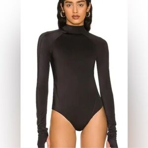 We are HAH Hot As Hell Gloves Off bodysuit in Noir backless mock neck